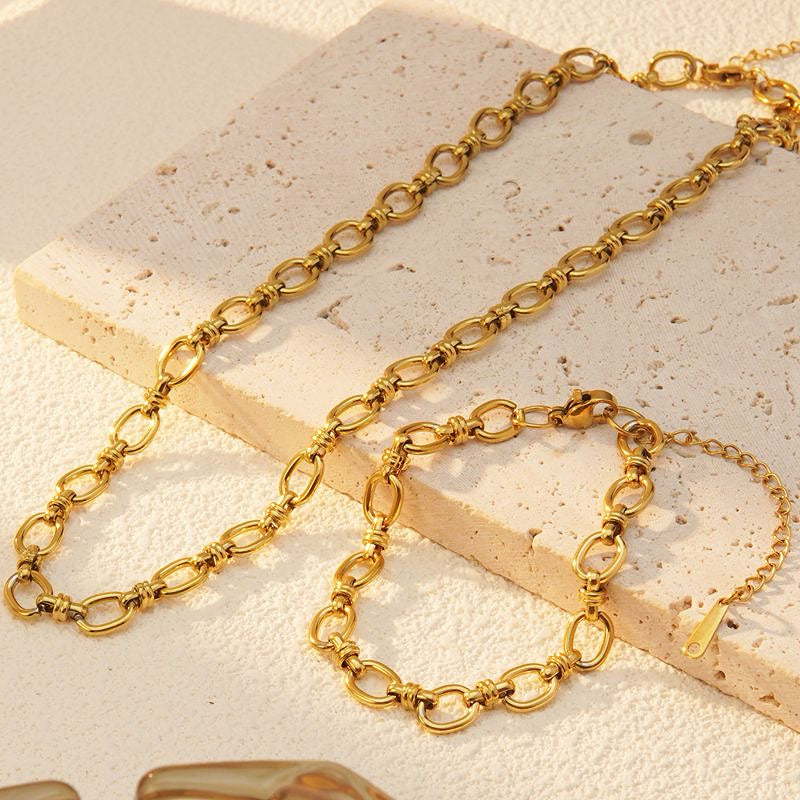 Juego de collar y pulsera eslabones dorado